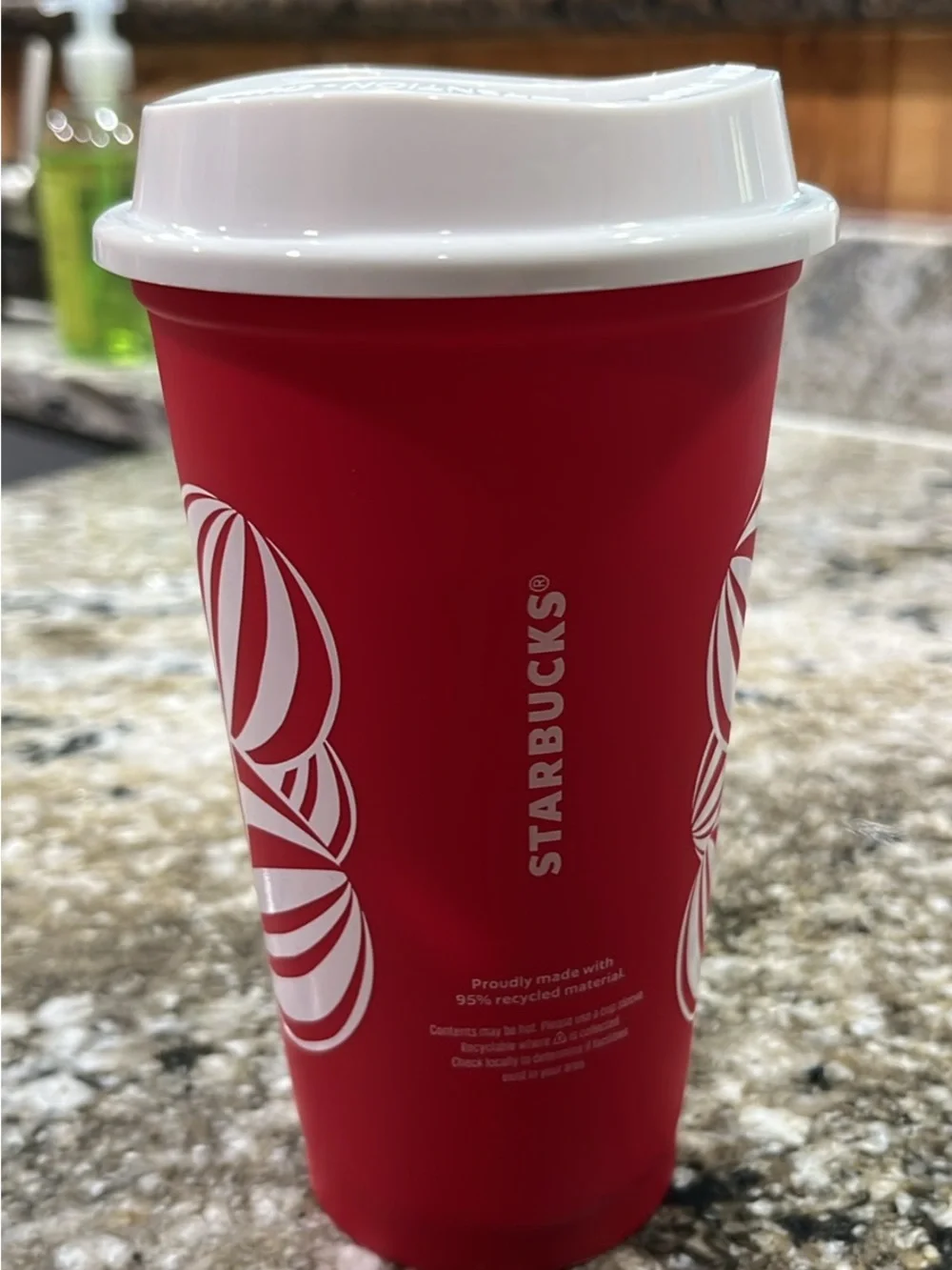 Starbucks Red Cup with Green Logo and White Lid
